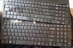 new keyboard beside old broken keyboard