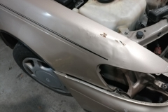 popping a dent out of fender