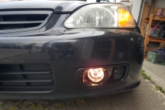fog lights installed, bumper mounted (fog lights on, drivers side)